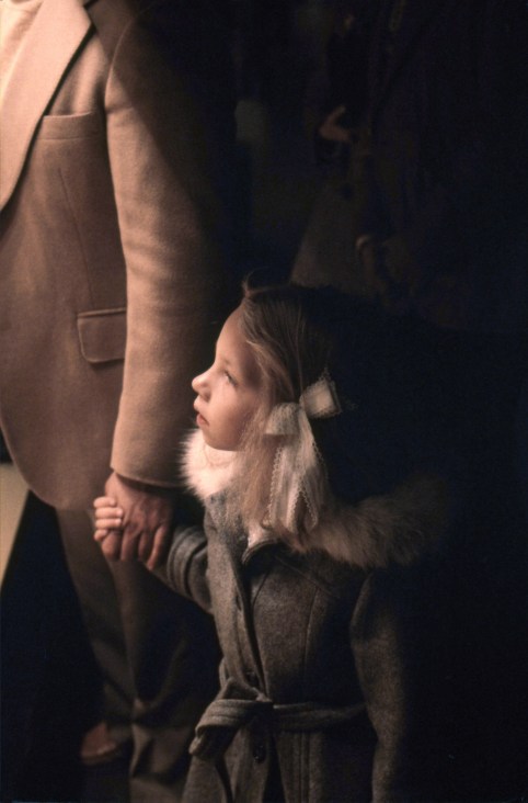 g802p001 looking at faberge eggs in Gumps window christmas 1979